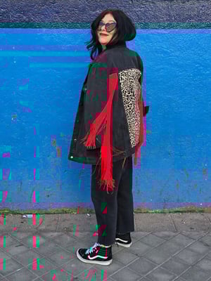 Chaqueta leopardo y flecos