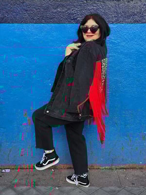 Chaqueta leopardo y flecos