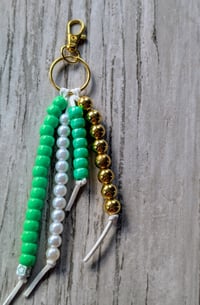 Image 1 of St. Patrick's Day green, white and gold beaded purse charm keychain 