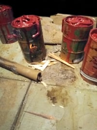 FxBxG burning barrel full of pulverized body parts