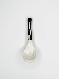 black and white ceramic teaspoon
