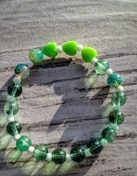 Image 1 of St. Patrick's Day green heart beaded stretch bracelet 