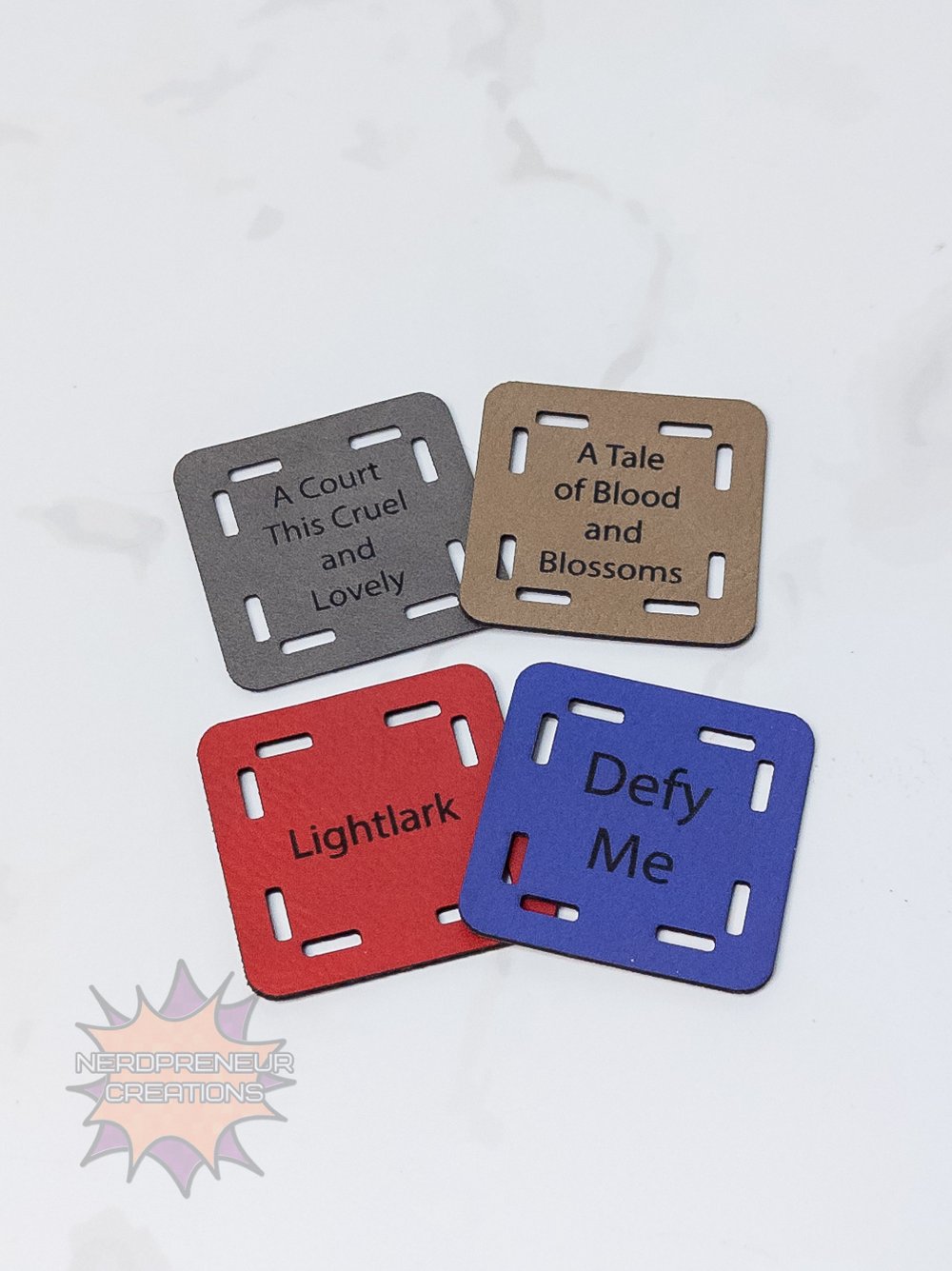 Image of Bookish Granny Starter Tags β Small Faux Leather Granny Square Patch for Book-Themed Crochet