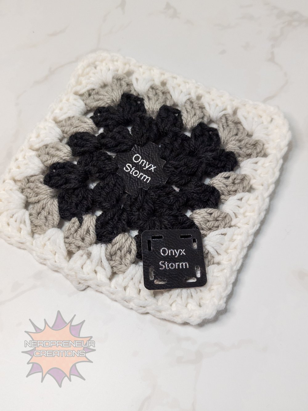 Image of Bookish Granny Starter Tags β Small Faux Leather Granny Square Patch for Book-Themed Crochet