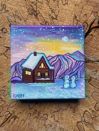 Snowy Cabin at twilight