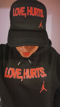 Image 1 of Love, Hurts Trucker Hat 