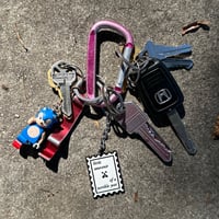 Image 2 of the sundays enamel keychain