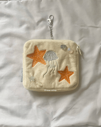 Image 2 of on the shore plush pouch