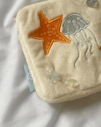 Image 4 of on the shore plush pouch