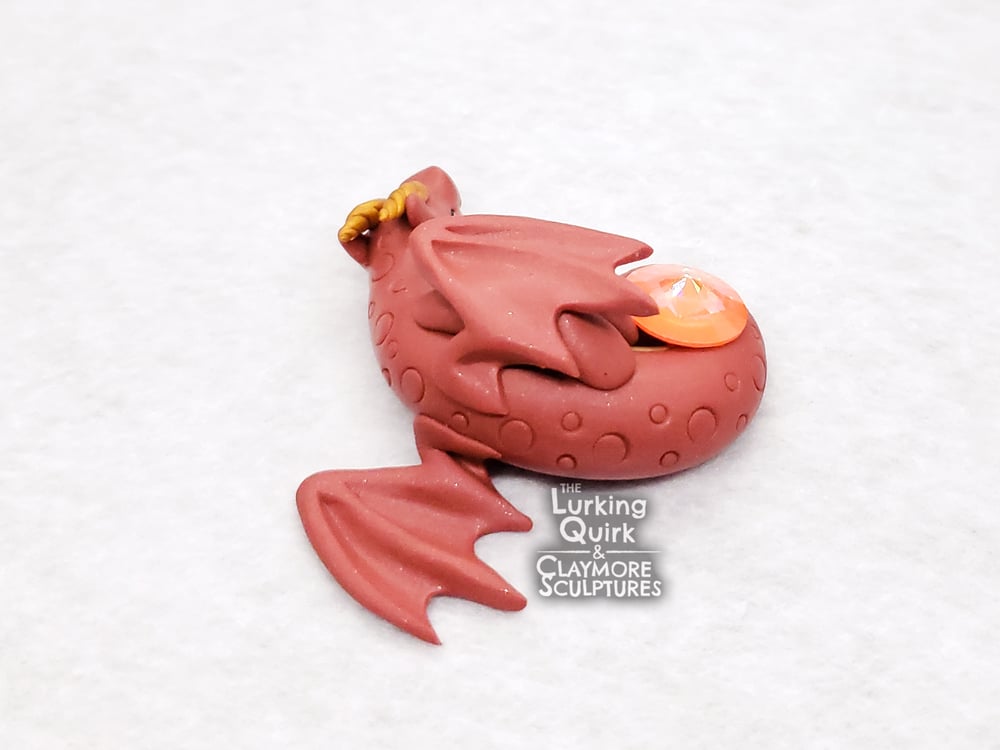 Small Red Sleeping Dragon with Orange Crystal