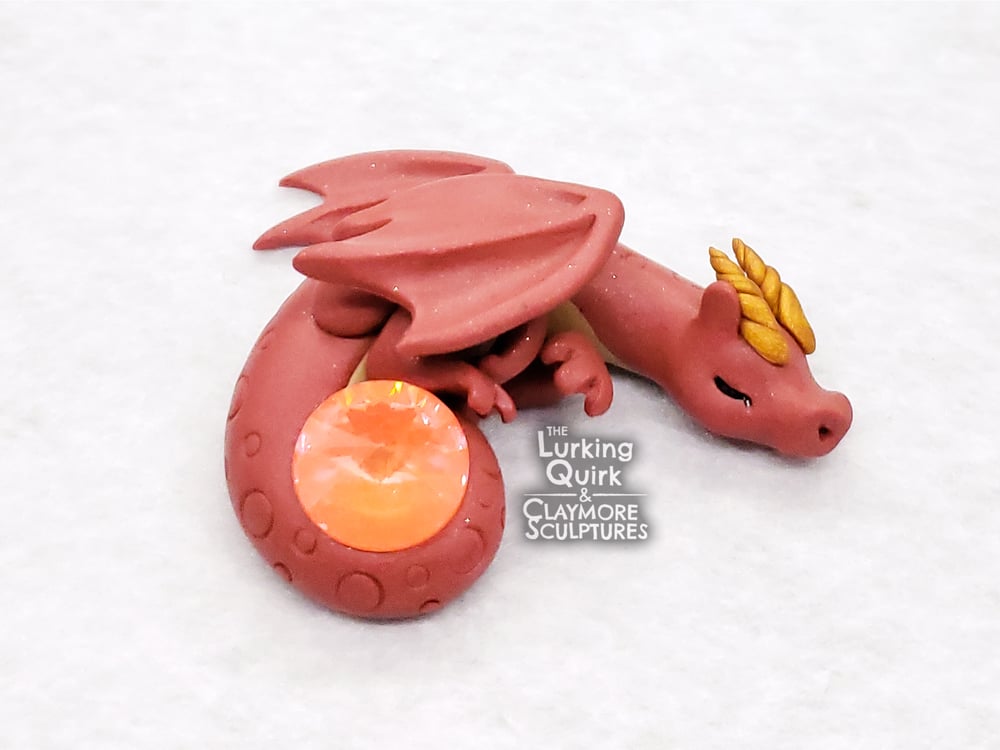 Small Red Sleeping Dragon with Orange Crystal