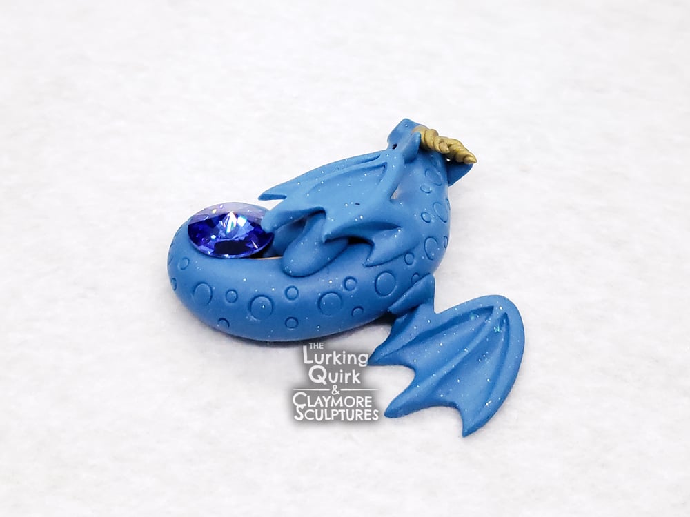 Small Blue Sleeping Dragon with Blue Crystal