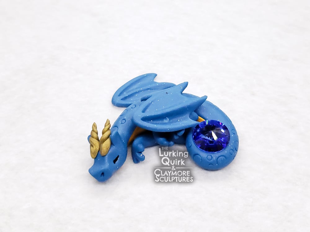 Small Blue Sleeping Dragon with Blue Crystal