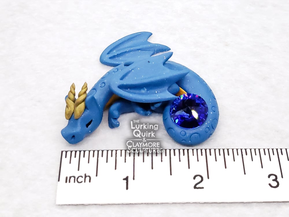 Small Blue Sleeping Dragon with Blue Crystal