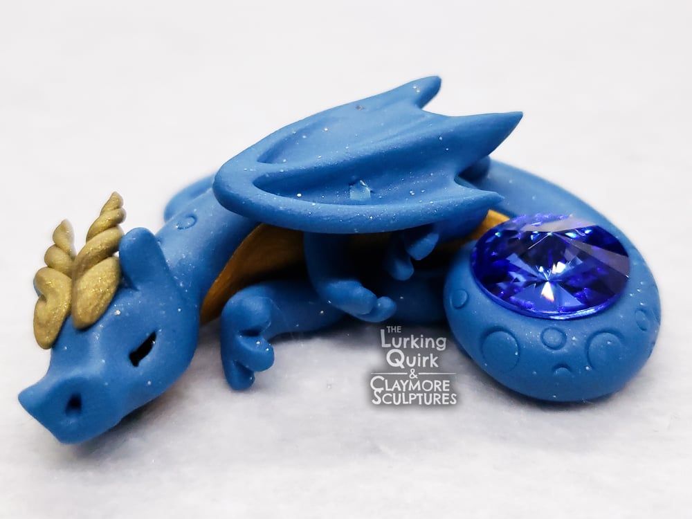 Small Blue Sleeping Dragon with Blue Crystal