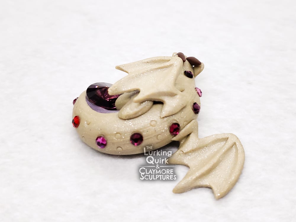 Small Glittery Beige Sleeping Dragon with Deep Purple Crystal