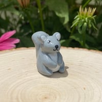 Image 1 of Squirrel Clay Figure