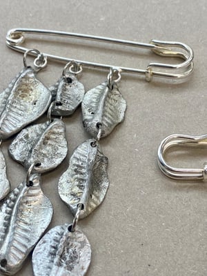 Image of "Spines" charm pin