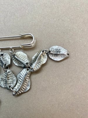 Image of "Spines" charm pin