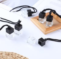 Image 4 of Sleek Black Top Clear Bottom Hanging Car Diffuser