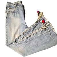 Image 3 of Women's Calvin Klein Vintage flare bottom jeans criss cross suede ties on sides knee to hem