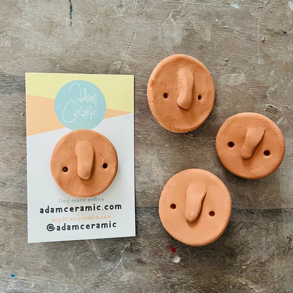 Image of Terracotta pin badge