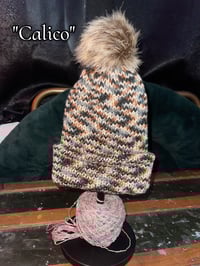 Image 9 of Knitted Beanie With Puff Ball