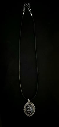 Image 1 of spider web heart necklace