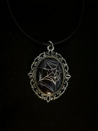 Image 2 of spider web heart necklace