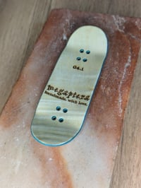 Image 3 of Mini logo (zebra wood) - G4.1 34mm