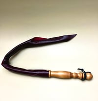 Image 1 of Dragon Tail leather impact toy in dark red