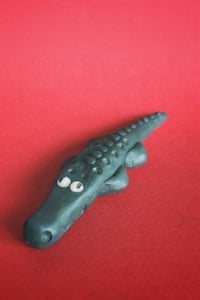 Image 1 of clay gator