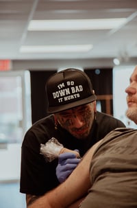 Image 1 of It Hurts Trucker Hat
