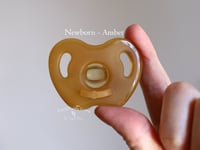Image 1 of Silicone Pacifier - Amber - Flat Nipple - Newborn and Up