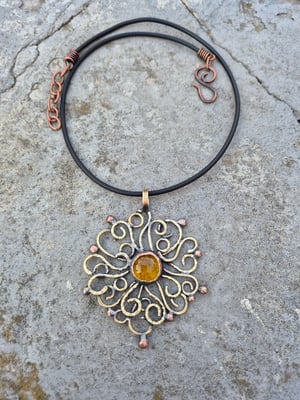 Curly sun pendant 