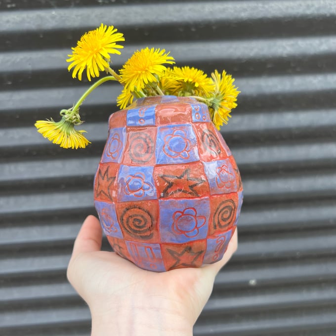 Image of blue checker doodle vase