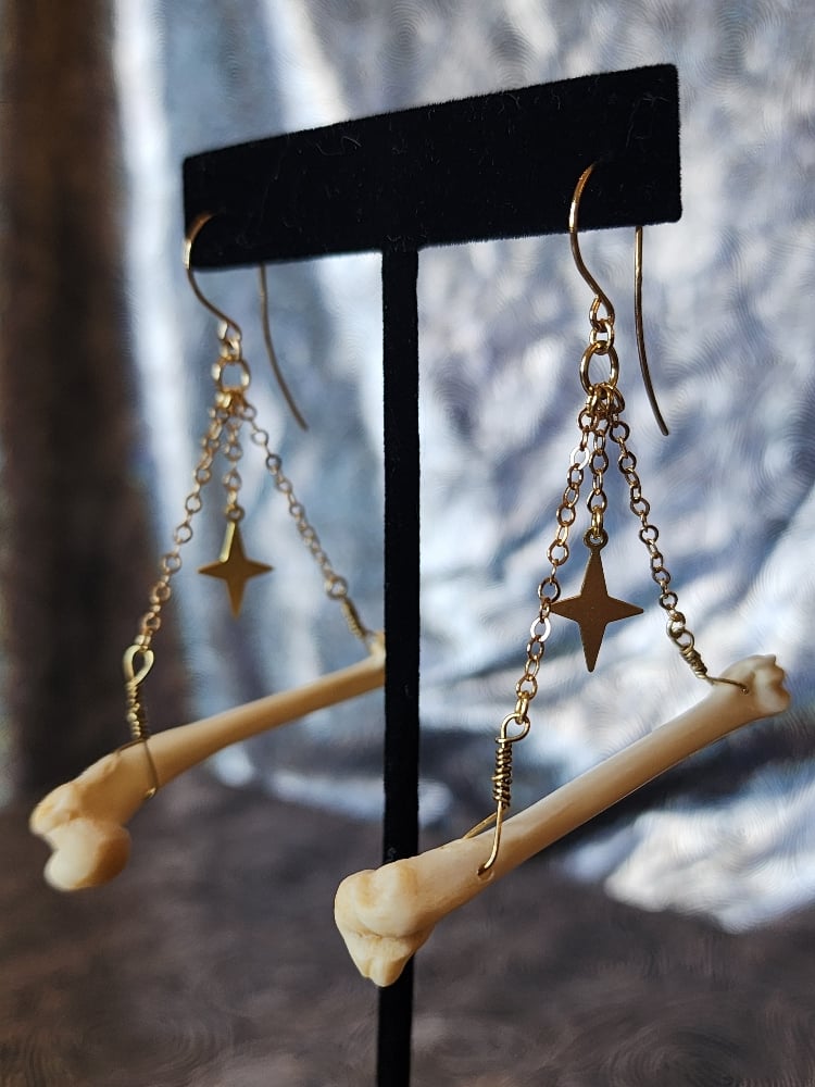 Image of gold rabbit leg earrings