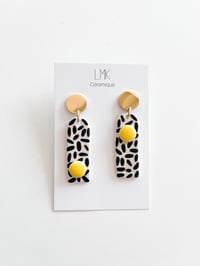 Paire de boucles d'oreilles céramique TOTA + 1