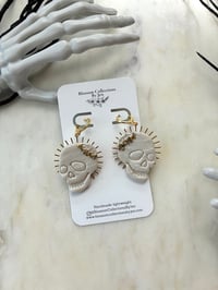 Image 1 of Sunny skulls