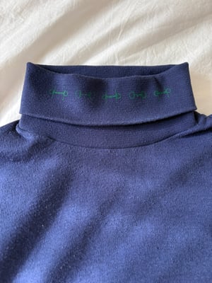 Image of Horsebit Turtleneck Sweatshirt