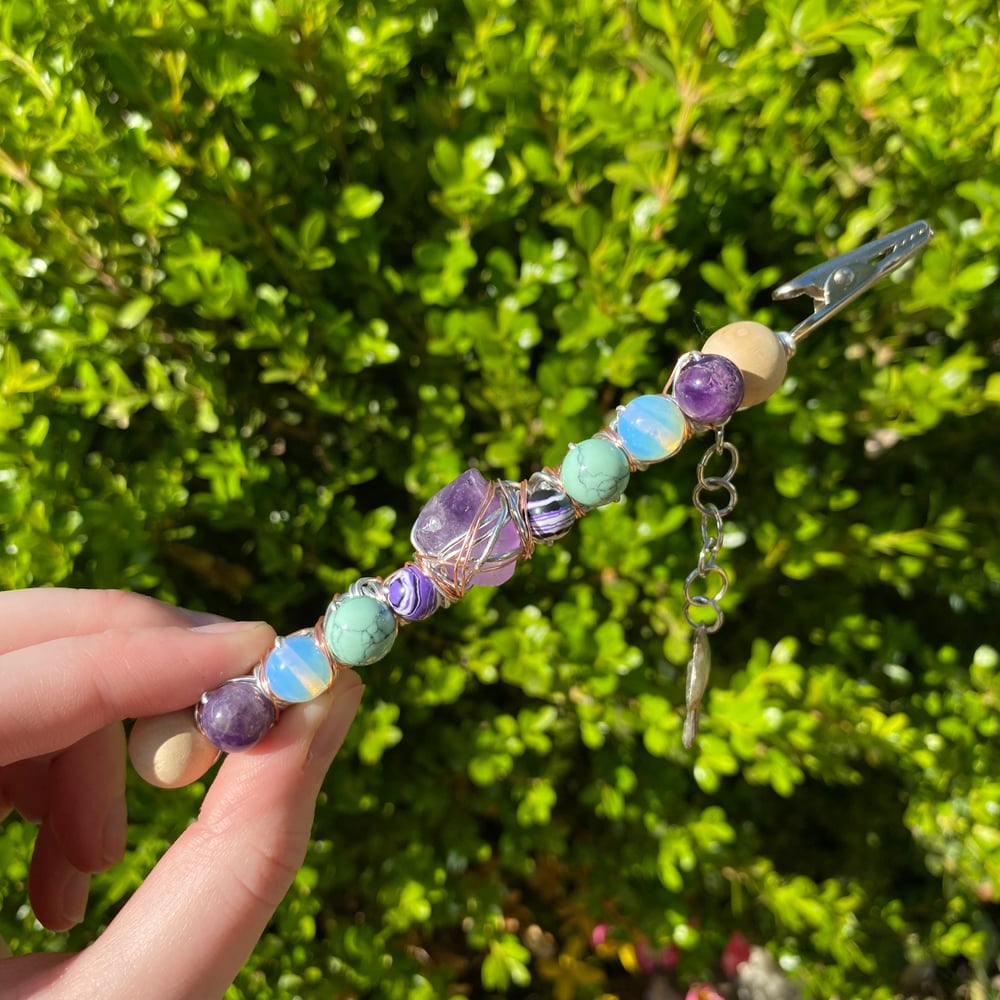 Image of lilac sea foam roach clips