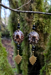 Image 1 of Shell charm