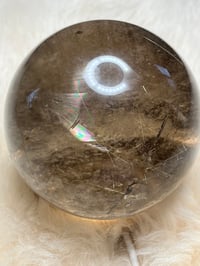 Image 18 of Golden Rutile In Smoky Quartz Sphere #1771