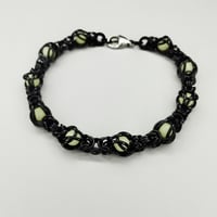 Image 3 of Black + Aqua Glow-in-the-Dark Capture Sphere Bracelet