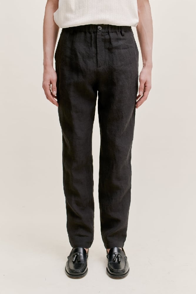 Image of A KIND OF GUISE ELASTICATED WIDE TROUSERS MYSTIC BLACK