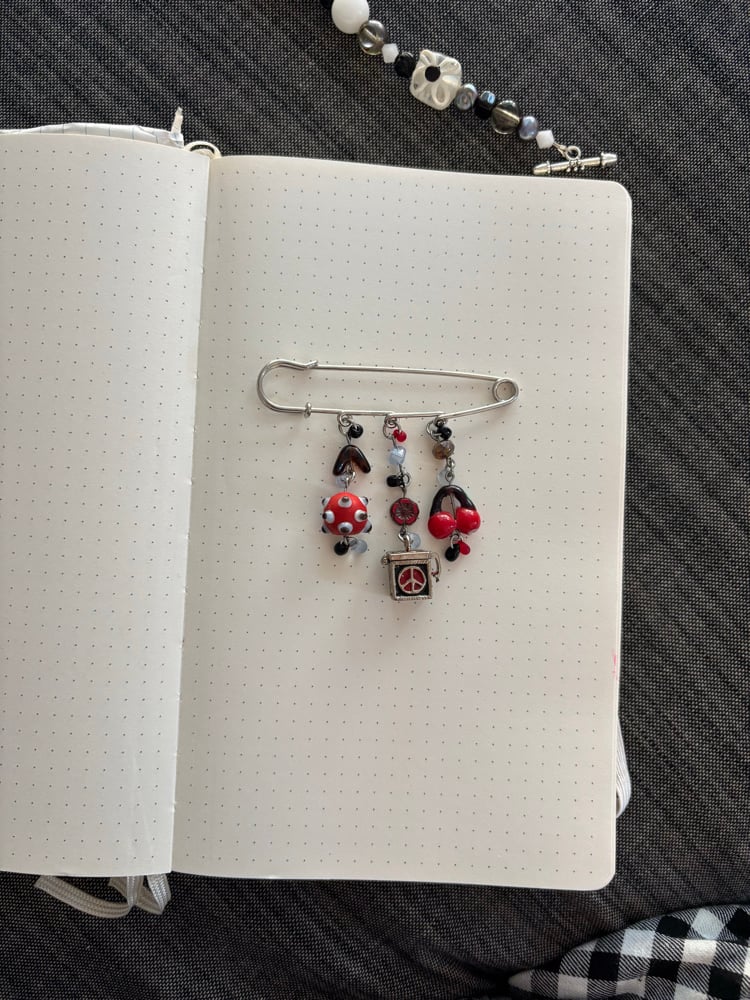 Image of peace sign prayer box