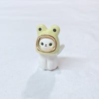 Image 2 of white cat with frog hat ceramic figurine