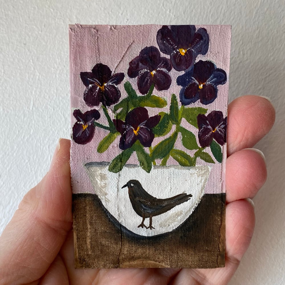 Image of violas in a bird bowl - tiny painting