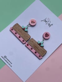 Image 1 of Yule log with pastel mint holly