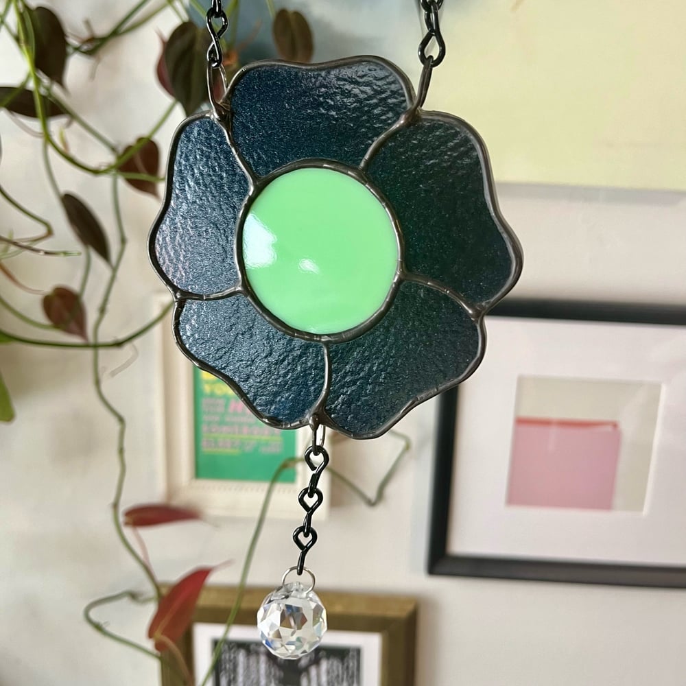 Image of Flower w/ a Dangling Crystal 